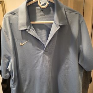 NIKE  Men’s Sky Blue Polo Shirt with White Swoosh
